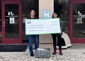 Meridian Canine Rescue accepting a Shelter Surprise check